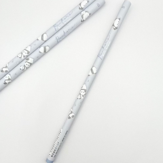 Two light blue pencils with decorative panda designs on a light gray background