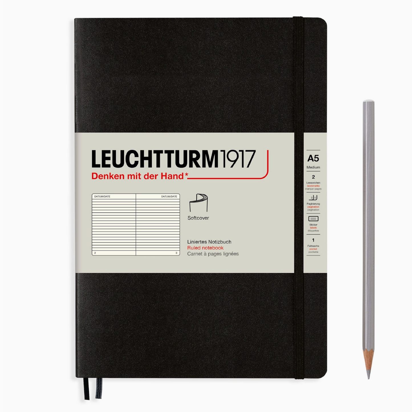 Black notebook with visible branding and a pencil on a white background
