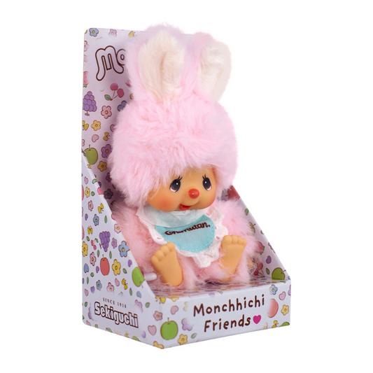 Monchhichi Friends toy in packaging with pink hair and blue outfit on a white background