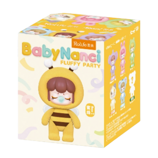 Box of a toy figure named 'BabyNanci' with a character in a yellow outfit on a white background.