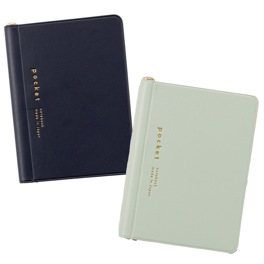 Two notebooks, one navy and one light gray, with 'Pocket' branding on a white background.