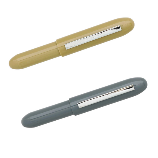 Two pens, one beige and one gray, on a white background