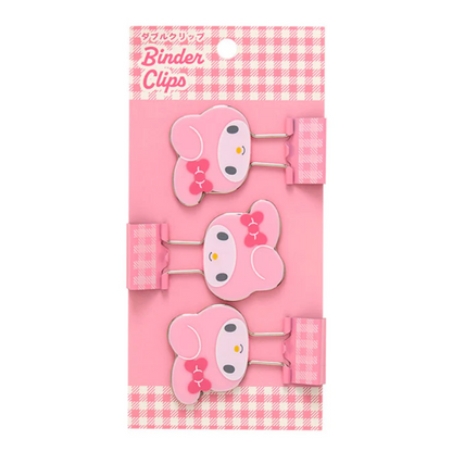 Set of pink binder clips with cartoon character design on a pink and white checkered background