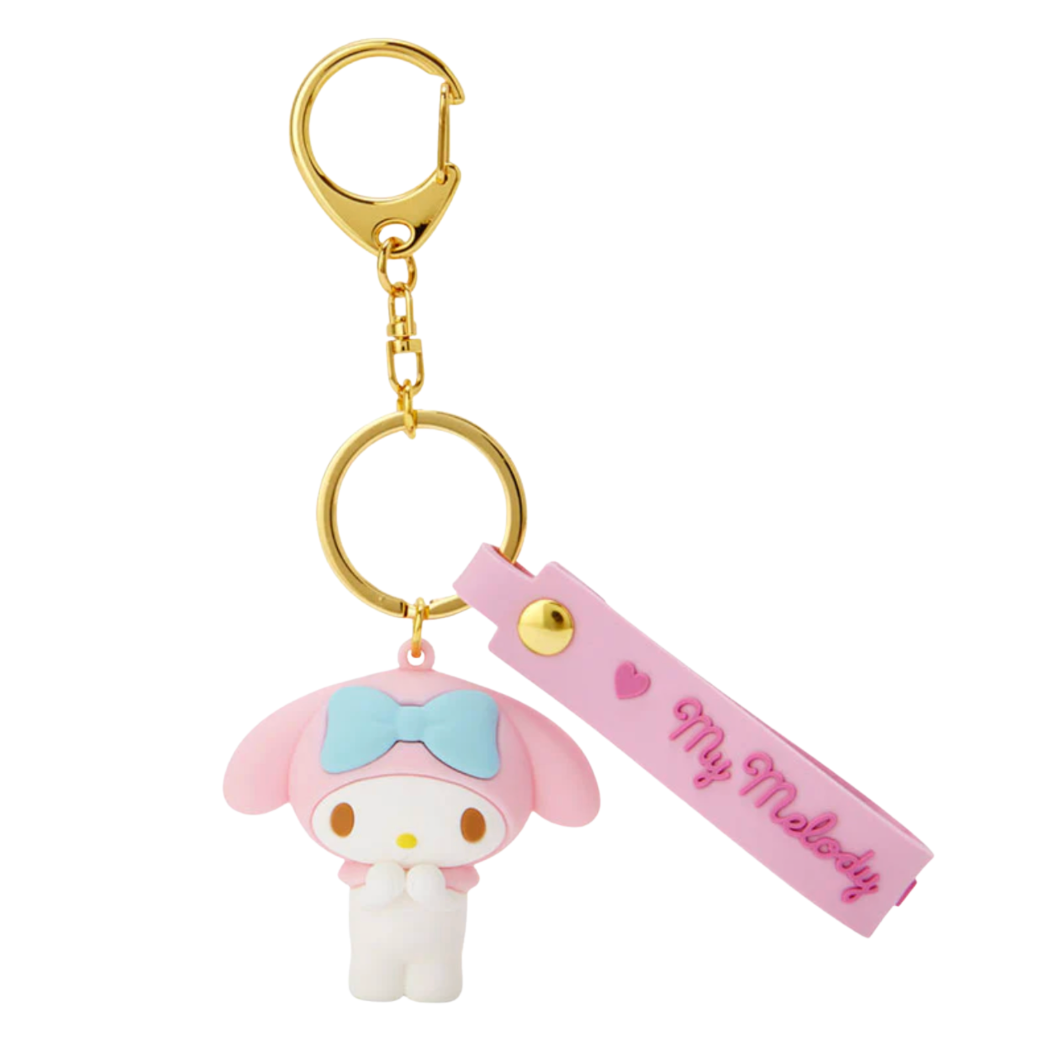 Keychain with a cute character and pink strap on a white background