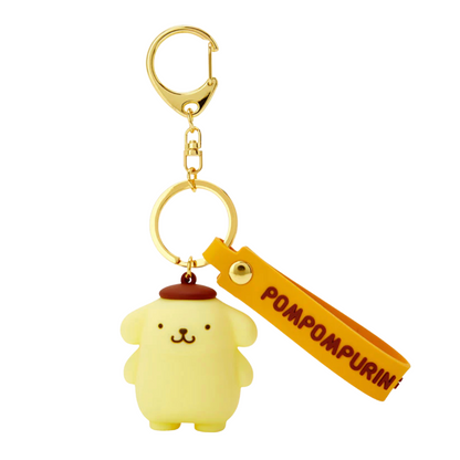 Pompompurin keychain with a gold tag on a white background