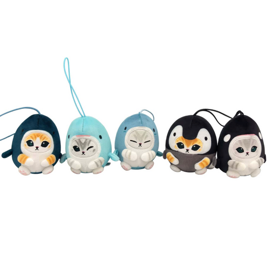 Set of five cartoon animal keychains on a white background