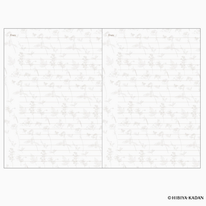 Two lined pages with a subtle pattern, likely from a notebook or planner, on a white background.