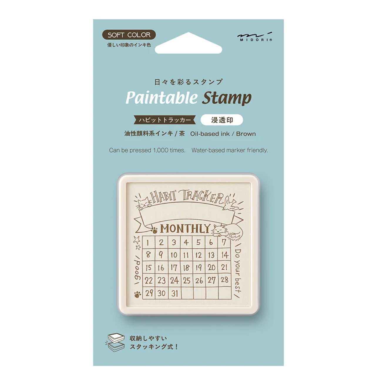Paintable Stamp monthly calendar ink stamp in its original packaging, featuring a light blue card with product details and a clear window showing the beige rubber stamp.