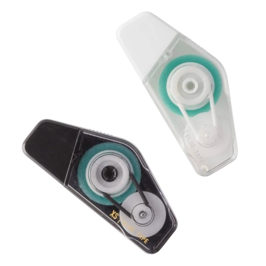 Two correction tape dispensers on a plain white background, one with a black casing and one with a clear casing showing a mint green inner spool.