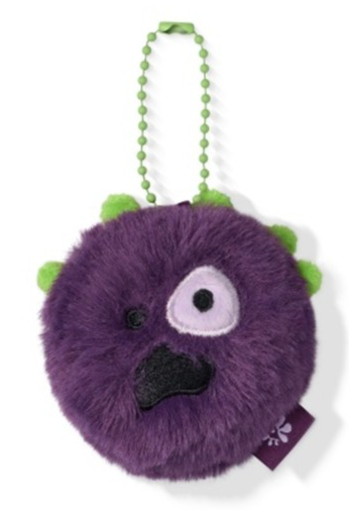 A purple fuzzy monster plush keychain with green spikes, a green ball chain, and a small fabric tag, shown on a white background.