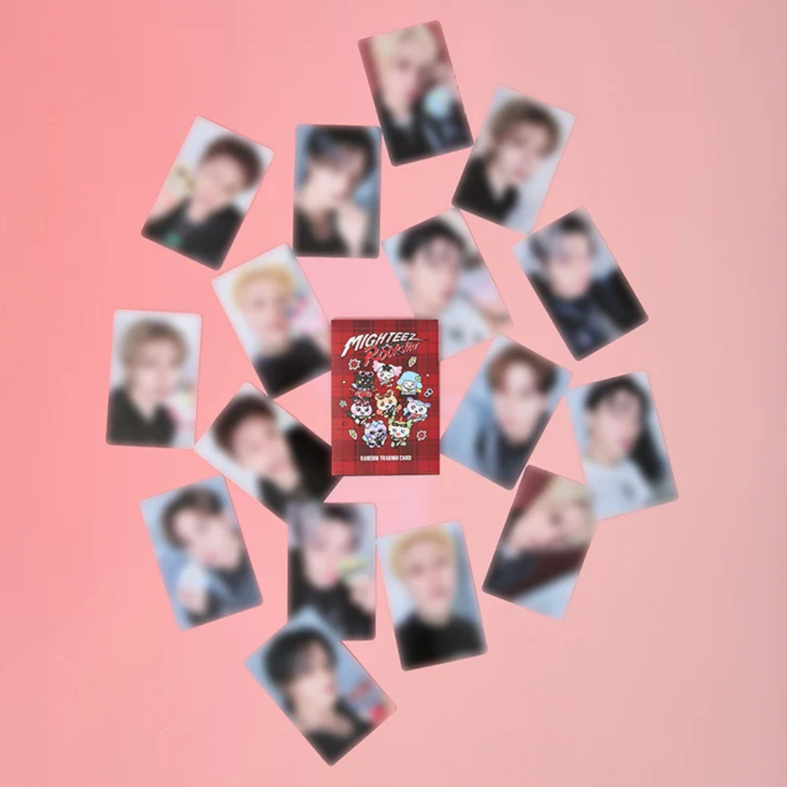 A red packaging featuring the 'MIGHTEEZ' logo and colorful cartoon characters is centered on a pink background, surrounded by multiple blurred rectangular cards showing portraits of a person.