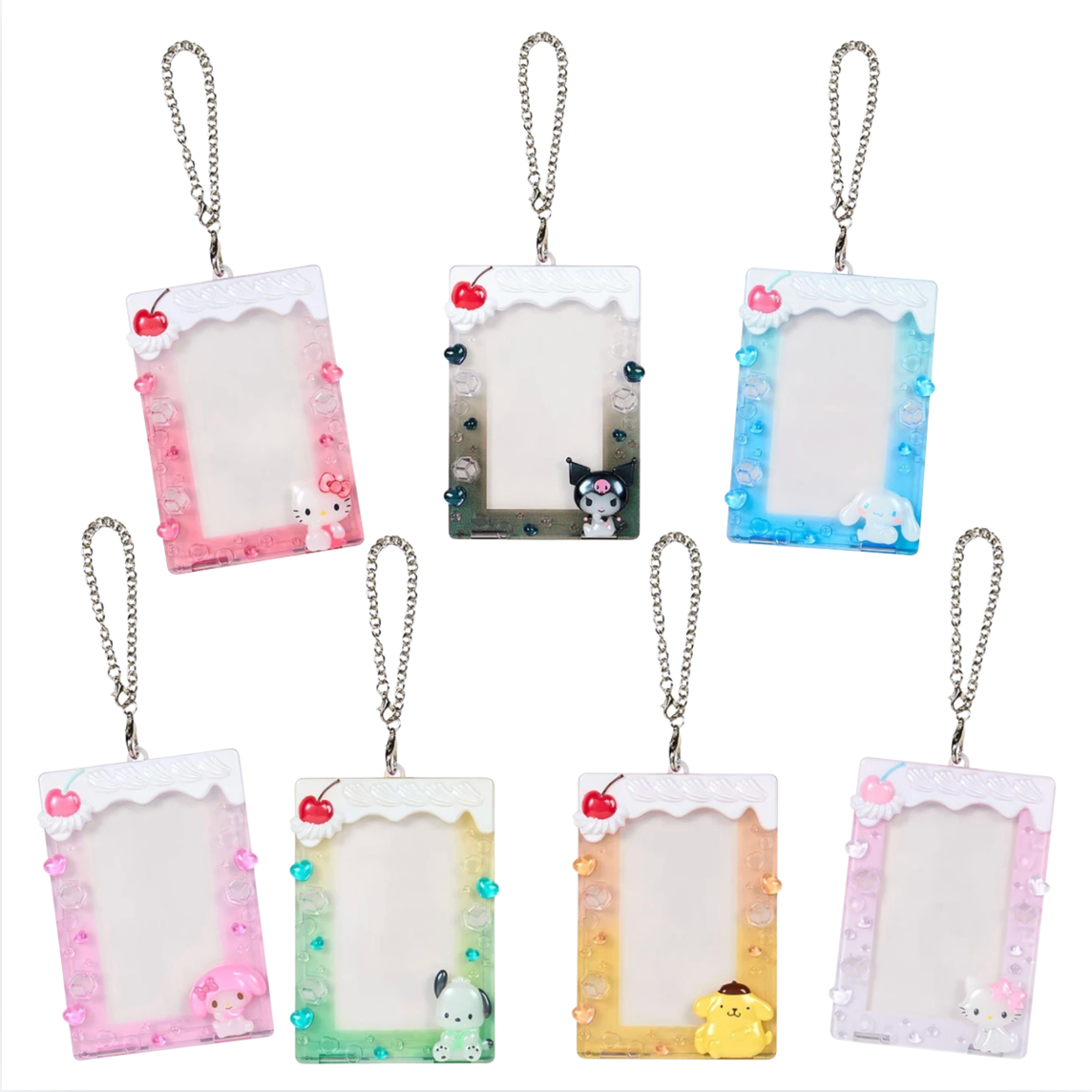 Seven acrylic photo frame keychains with silver chains, arranged in a 2x4 grid on a white background. Each frame has a different pastel color scheme and cute character designs including Sanrio characters.