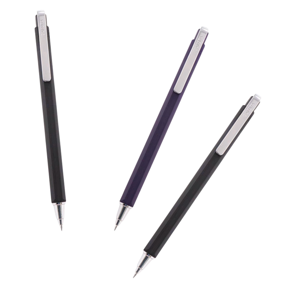 Three retractable ballpoint pens arranged diagonally on a plain white background: one black, one dark purple, and another black each with a silver clip and silver tip.