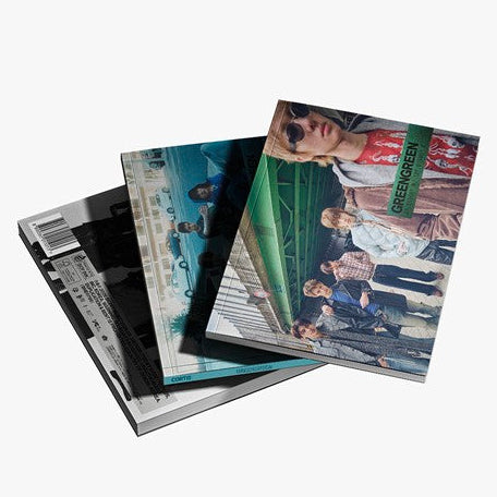 3 photobook album versions from CORTIS GREENGREEN stacked on a white background