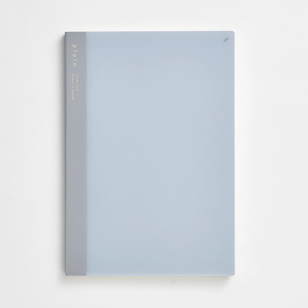 Light blue notebook with gray spine on a white background