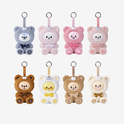 Set of small bear-shaped keychains in various colors on a white background